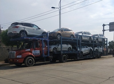 从上海托运小汽车到石河子多少钱？